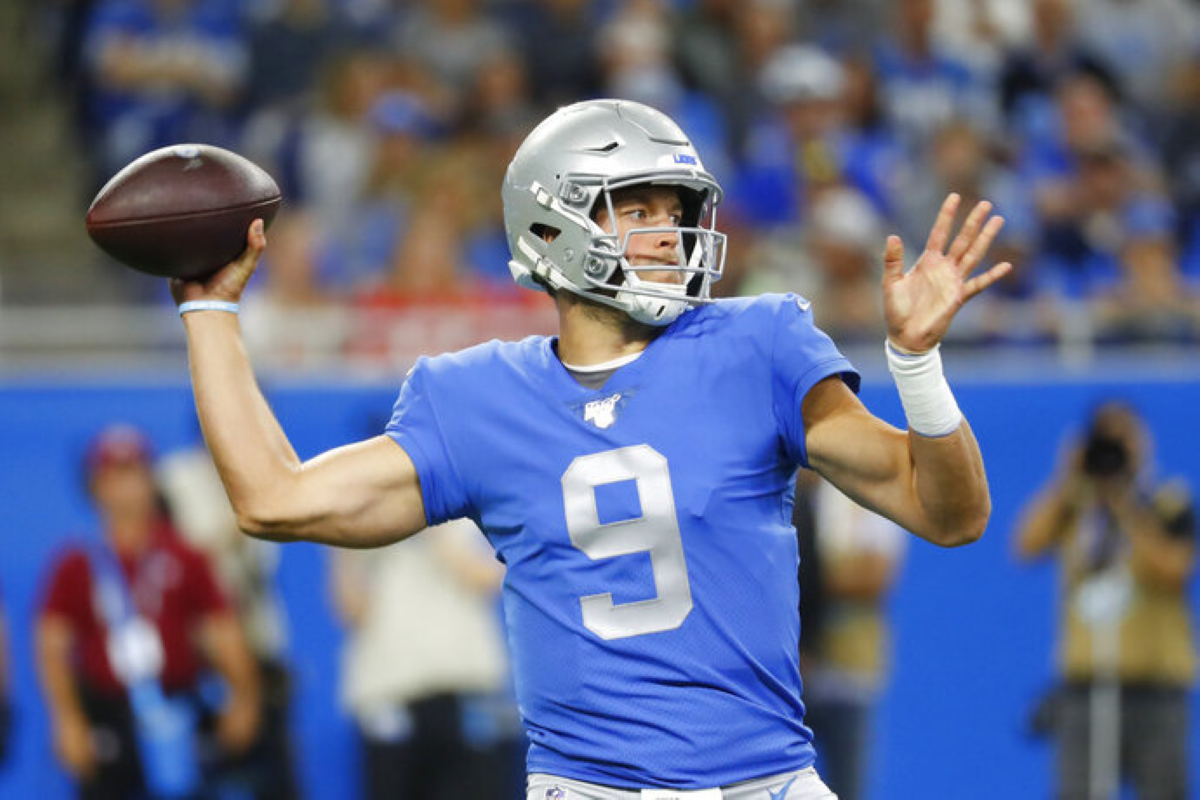 A Detroit Lions fan wears a bag during the fourth quarter of an NFL  football game against the Chicago Bears at Ford Field in Detroit, Sunday,  Dec. 5, 2010. (AP Photo/Carlos Osorio