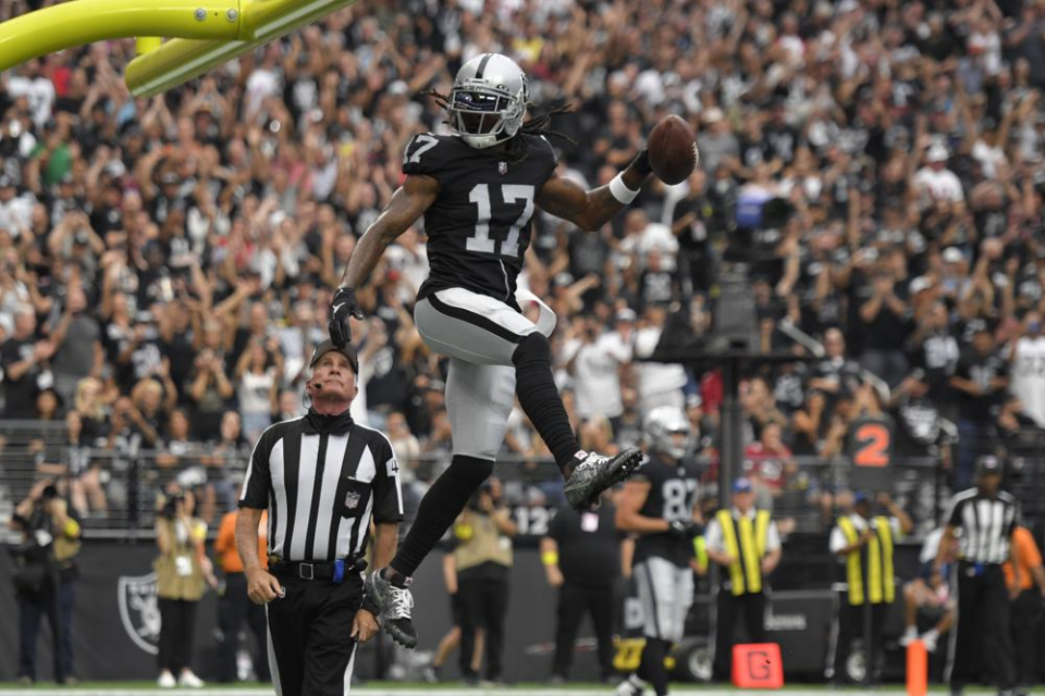 Jacksonville, United States. 06th Nov, 2022. Saturday, November 6, 2022;  Jacksonville, FL USA; Las Vegas Raiders wide receiver Davante Adams (17)  celebrates scoring a touchdown with center Andre James (68) during an